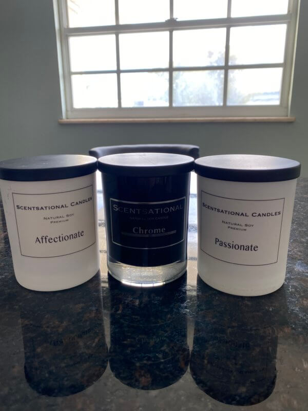 Three soy candles with scents Affectionate, Chrome and Passionate.