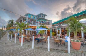 Customers enjoy a lovely evening dining at Matanzas on The Bay.